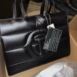 TELFAR X MOOSE KNUCKLES MEDIUM BAG .